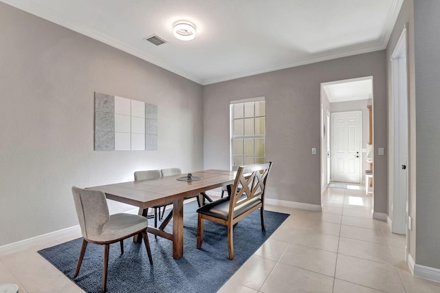 850 NW 83rd Ln, Boca Raton, FL 33487 - dining space featuring baseboards, light tile patterned floors, and crown molding