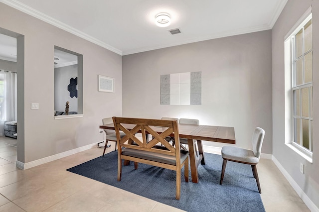 850 NW 83rd Ln, Boca Raton, FL 33487 - dining area featuring ornamental molding, baseboards, and light tile patterned floors