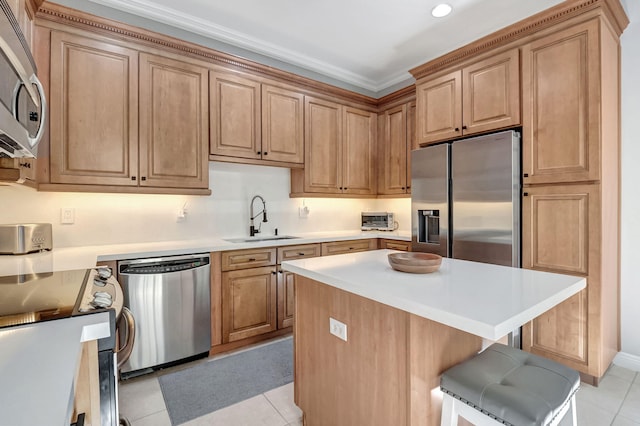 850 NW 83rd Ln, Boca Raton, FL 33487 - kitchen with appliances with stainless steel finishes, a sink, light tile patterned floors, and a kitchen bar