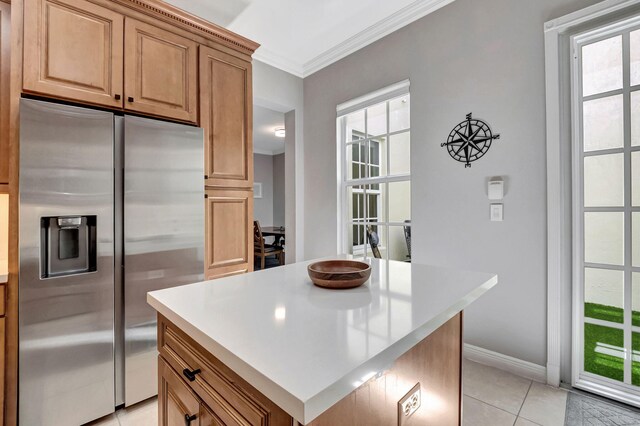 850 NW 83rd Ln, Boca Raton, FL 33487 - kitchen featuring stainless steel refrigerator with ice dispenser, crown molding, light tile patterned flooring, baseboards, and light countertops