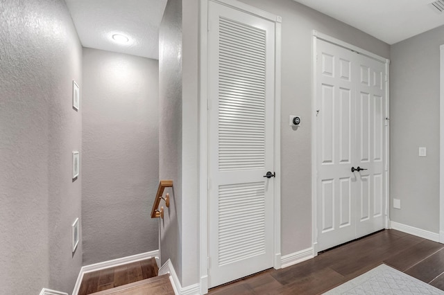 850 NW 83rd Ln, Boca Raton, FL 33487 - staircase with wood finished floors and baseboards