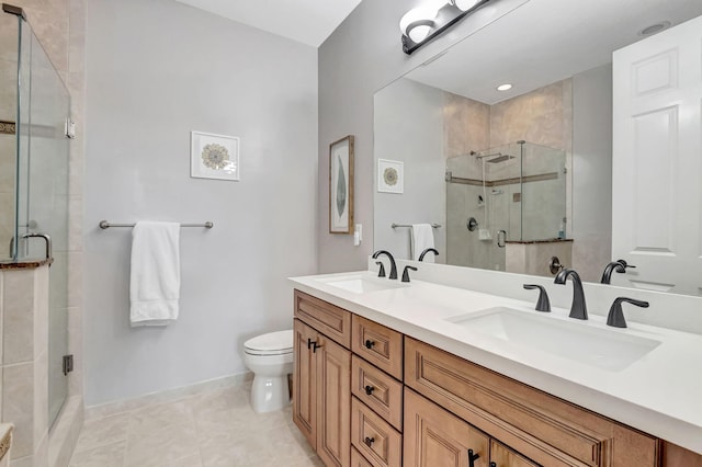 850 NW 83rd Ln, Boca Raton, FL 33487 - bathroom featuring baseboards, double vanity, toilet, a stall shower, and tile patterned floors