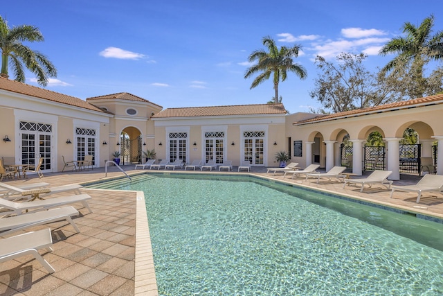 850 NW 83rd Ln, Boca Raton, FL 33487 - community pool with french doors and a patio