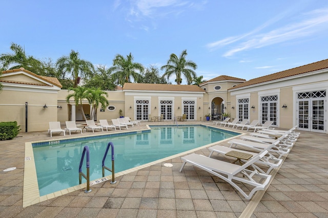 850 NW 83rd Ln, Boca Raton, FL 33487 - community pool featuring french doors and a patio area