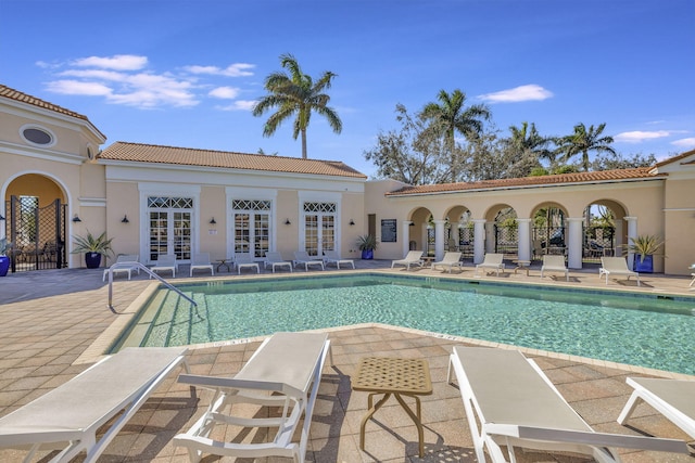 850 NW 83rd Ln, Boca Raton, FL 33487 - community pool featuring french doors and a patio