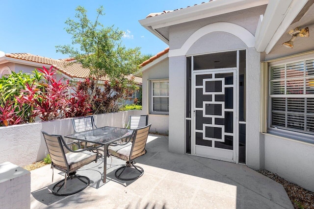 15318 W Tranquility Lake Dr, Delray Beach, FL 33446 - view of patio featuring outdoor dining space