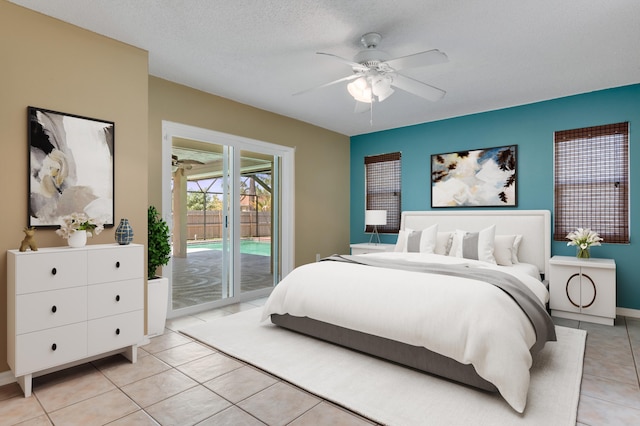 1030 Locust Ave NW, Palm Bay, FL 32907 - bedroom with access to exterior, light tile patterned flooring, a ceiling fan, and baseboards