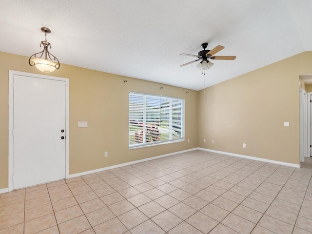 1030 Locust Ave NW, Palm Bay, FL 32907 - unfurnished room featuring a ceiling fan, baseboards, and lofted ceiling