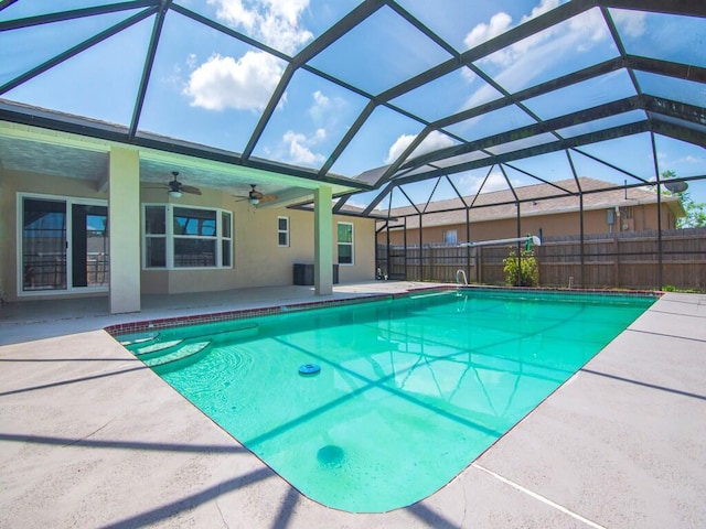 1030 Locust Ave NW, Palm Bay, FL 32907 - view of pool with ceiling fan, a patio area, and glass enclosure
