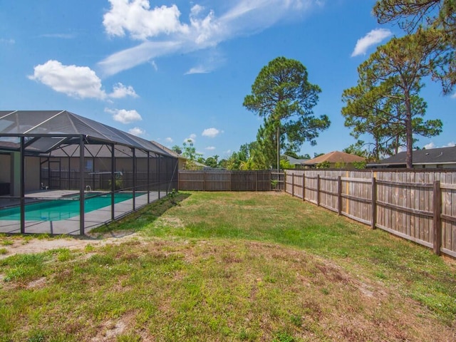 1030 Locust Ave NW, Palm Bay, FL 32907 - view of yard featuring glass enclosure