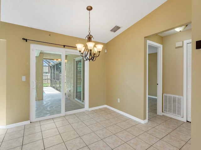 1030 Locust Ave NW, Palm Bay, FL 32907 - spare room with a chandelier, baseboards, lofted ceiling, and light tile patterned flooring