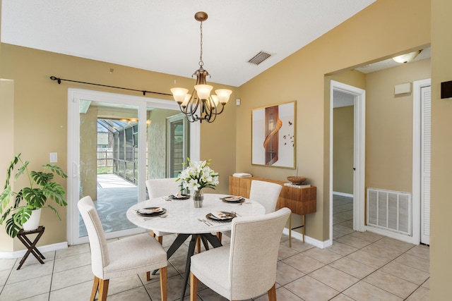 1030 Locust Ave NW, Palm Bay, FL 32907 - dining room featuring a chandelier, vaulted ceiling, light tile patterned floors, and baseboards