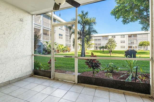 9880 Marina Blvd Unit 1504, Boca Raton, FL 33428 - unfurnished sunroom with healthy amount of natural light and ceiling fan