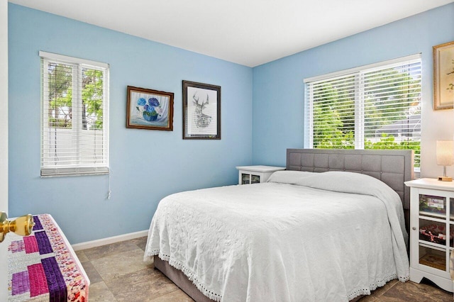 1858 Bartlett Ct, Lake Clarke Shores, FL 33406 - bedroom featuring multiple windows and baseboards