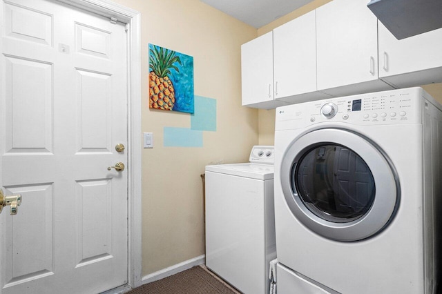 1858 Bartlett Ct, Lake Clarke Shores, FL 33406 - laundry area with washing machine and dryer, cabinet space, and baseboards