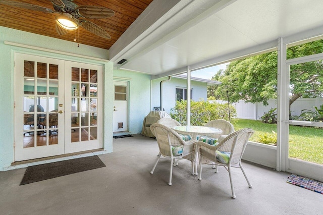 1858 Bartlett Ct, Lake Clarke Shores, FL 33406 - sunroom with french doors, a ceiling fan, and outdoor dining space