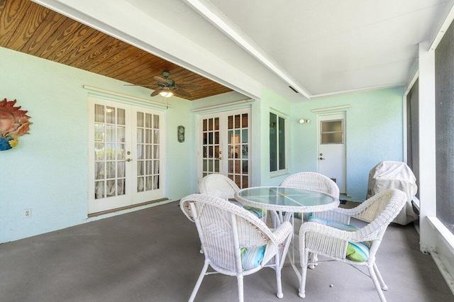 1858 Bartlett Ct, Lake Clarke Shores, FL 33406 - sunroom featuring french doors, ceiling fan, and outdoor dining space