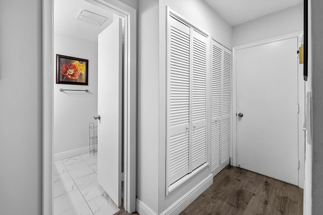 5135 Mirror Lakes Blvd, Boynton Beach, FL 33472 - corridor featuring marble look tiles and baseboards