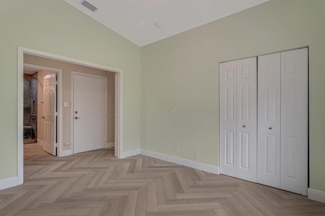8592 Logia Cir, Boynton Beach, FL 33472 - unfurnished bedroom featuring a closet and baseboards