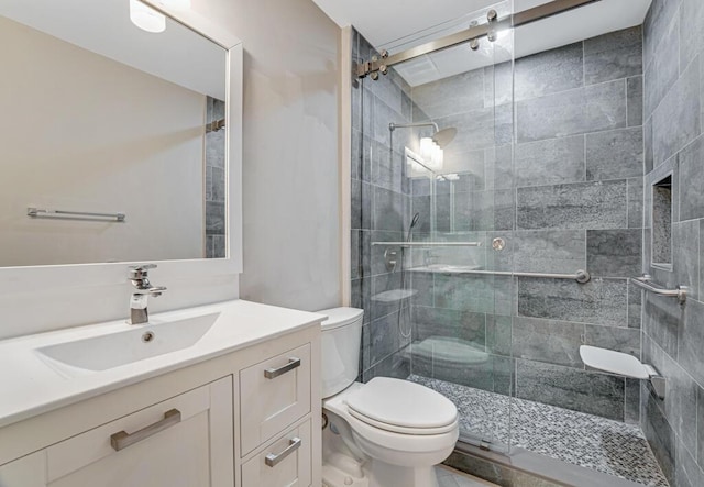 8592 Logia Cir, Boynton Beach, FL 33472 - bathroom with toilet, vanity, and a stall shower