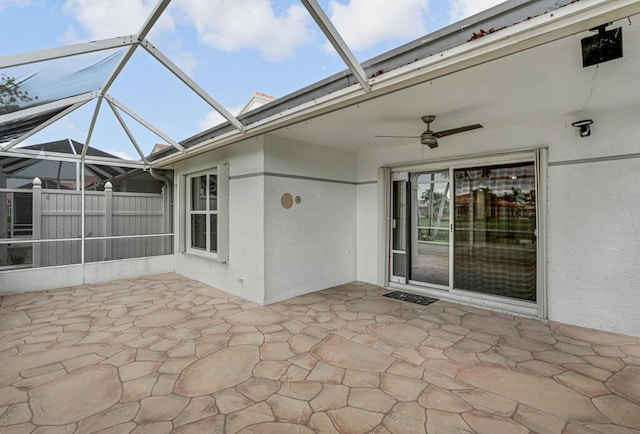 8592 Logia Cir, Boynton Beach, FL 33472 - unfurnished sunroom with ceiling fan
