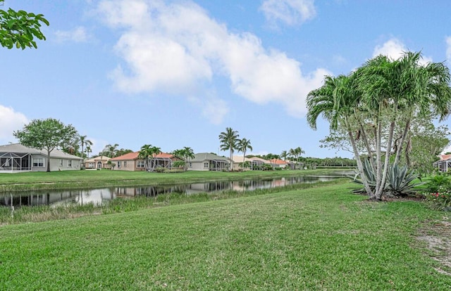 8592 Logia Cir, Boynton Beach, FL 33472 - view of grassy yard featuring a water view and a residential view