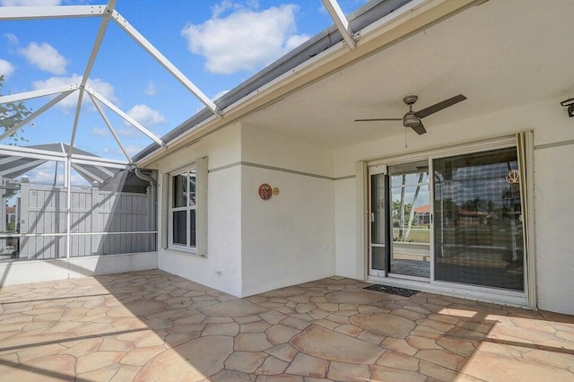 8592 Logia Cir, Boynton Beach, FL 33472 - view of patio with a ceiling fan and glass enclosure