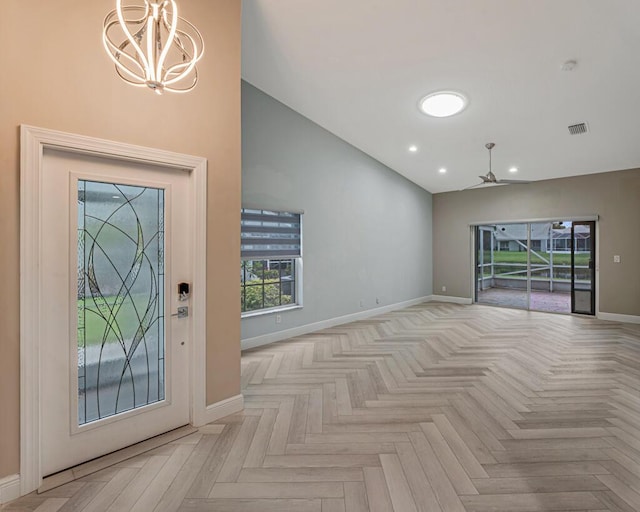 8592 Logia Cir, Boynton Beach, FL 33472 - foyer entrance with baseboards, high vaulted ceiling, a chandelier, a ceiling fan, and recessed lighting