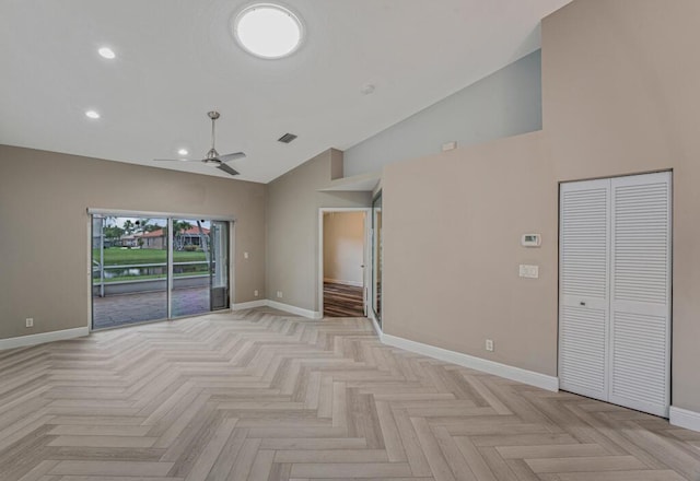 8592 Logia Cir, Boynton Beach, FL 33472 - unfurnished room featuring baseboards, a ceiling fan, high vaulted ceiling, and recessed lighting