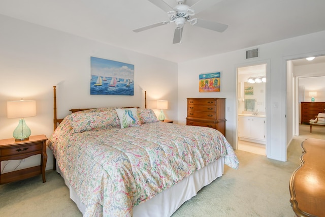 4 Garden St Unit 204N, Tequesta, FL 33469 - bedroom featuring light carpet, ceiling fan, and connected bathroom