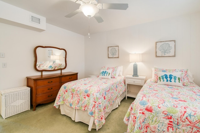 4 Garden St Unit 204N, Tequesta, FL 33469 - bedroom with light colored carpet, radiator heating unit, and ceiling fan