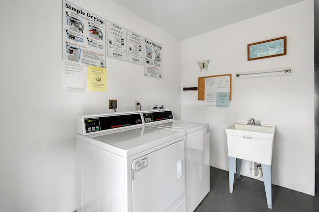 4 Garden St Unit 204N, Tequesta, FL 33469 - shared laundry room featuring independent washer and dryer