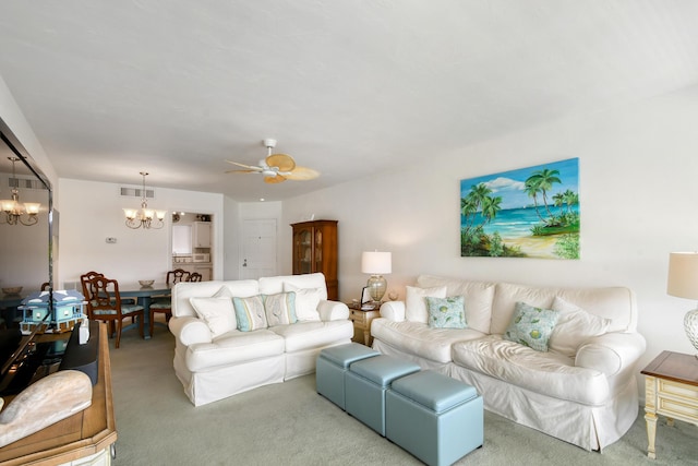 4 Garden St Unit 204N, Tequesta, FL 33469 - living area with a chandelier, light colored carpet, and a ceiling fan