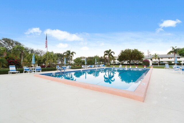 4 Garden St Unit 204N, Tequesta, FL 33469 - community pool with a patio