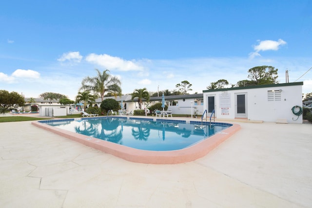 4 Garden St Unit 204N, Tequesta, FL 33469 - community pool featuring a patio