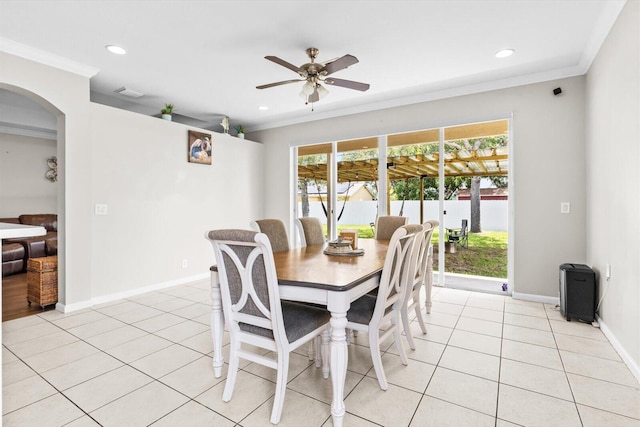 2481 SE Berkshire Blvd, Port Saint Lucie, FL 34952 - dining room featuring ornamental molding, a ceiling fan, light tile patterned floors, plenty of natural light, and recessed lighting