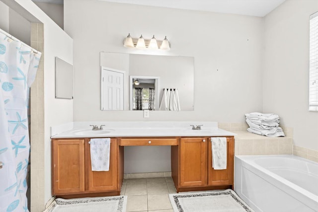 2481 SE Berkshire Blvd, Port Saint Lucie, FL 34952 - full bath featuring a garden tub, tile patterned floors, double vanity, and a shower with shower curtain