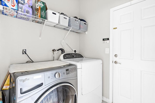 2481 SE Berkshire Blvd, Port Saint Lucie, FL 34952 - laundry room with washer and dryer