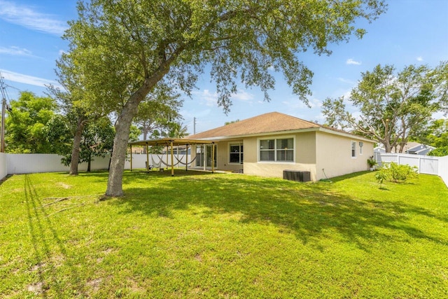 2481 SE Berkshire Blvd, Port Saint Lucie, FL 34952 - back of house featuring stucco siding and central AC