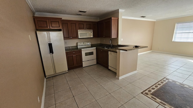 11474 NW 42nd St Unit 11474, Coral Springs, FL 33065 - kitchen with white appliances, a sink, light tile patterned flooring, ornamental molding, and a textured ceiling