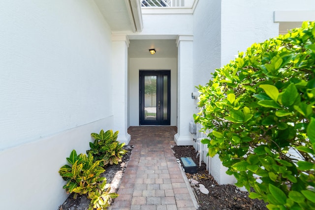 3040 Princeton Ln, Palm Beach Gardens, FL 33418 - view of exterior entry with stucco siding