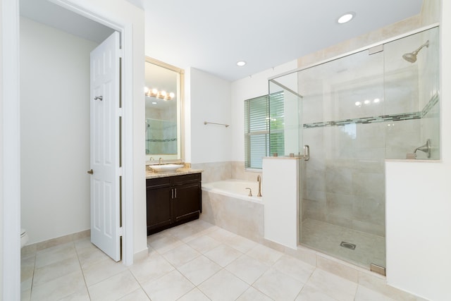3040 Princeton Ln, Palm Beach Gardens, FL 33418 - full bathroom with a garden tub, vanity, a shower stall, tile patterned floors, and recessed lighting
