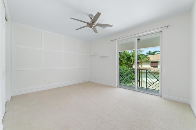 3040 Princeton Ln, Palm Beach Gardens, FL 33418 - empty room featuring carpet floors, ceiling fan, and baseboards