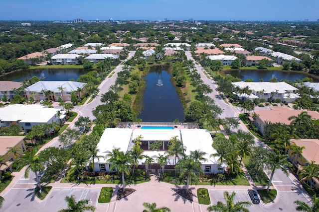 3040 Princeton Ln, Palm Beach Gardens, FL 33418 - aerial overview of property's location with a nearby body of water, a pool, and nearby suburban area