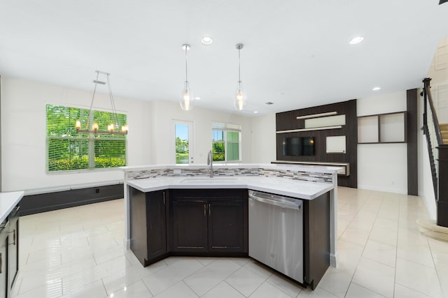 3040 Princeton Ln, Palm Beach Gardens, FL 33418 - kitchen with stainless steel dishwasher, a sink, recessed lighting, a kitchen island with sink, and light tile patterned floors