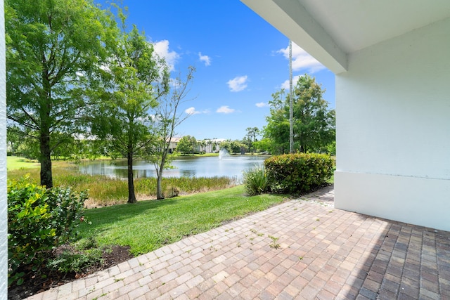 3040 Princeton Ln, Palm Beach Gardens, FL 33418 - view of patio / terrace featuring a water view