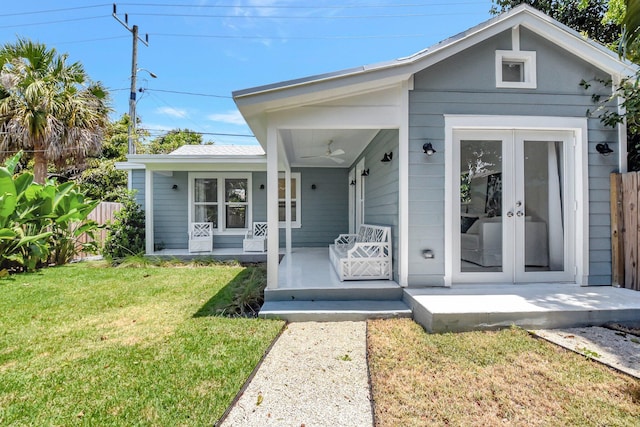 220 S L St, Lake Worth Beach, FL 33460 - view of front of house featuring french doors