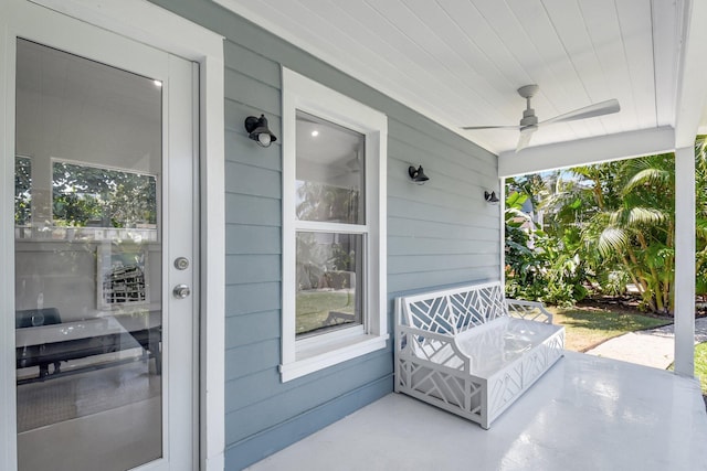 220 S L St, Lake Worth Beach, FL 33460 - view of exterior entry featuring covered porch and a ceiling fan