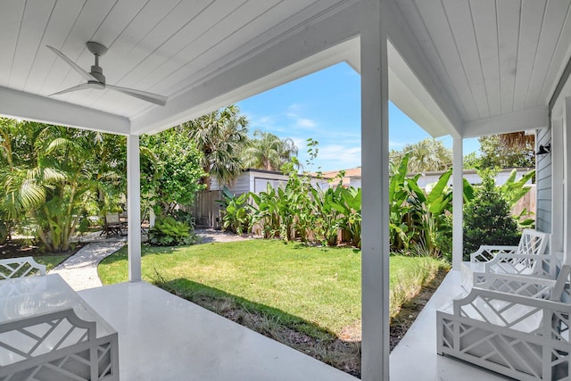 220 S L St, Lake Worth Beach, FL 33460 - view of yard featuring a patio, outdoor dining space, and a ceiling fan