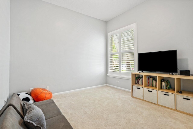 8940 New Hope Ct, West Palm Beach, FL 33411 - sitting room featuring light carpet and baseboards
